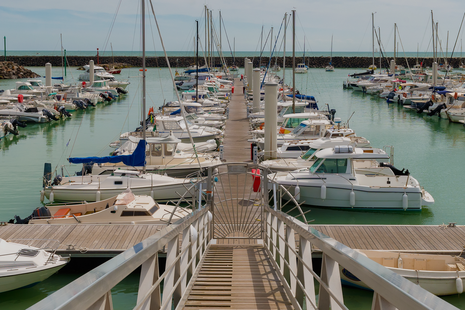 Marina filled with docked boats, illustrating how avoiding personalization pitfalls can help build guest loyalty.
