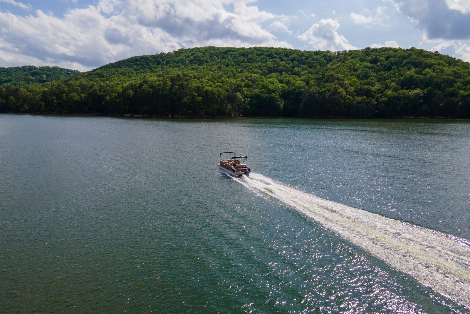 Boat using a license to drive on a lake.