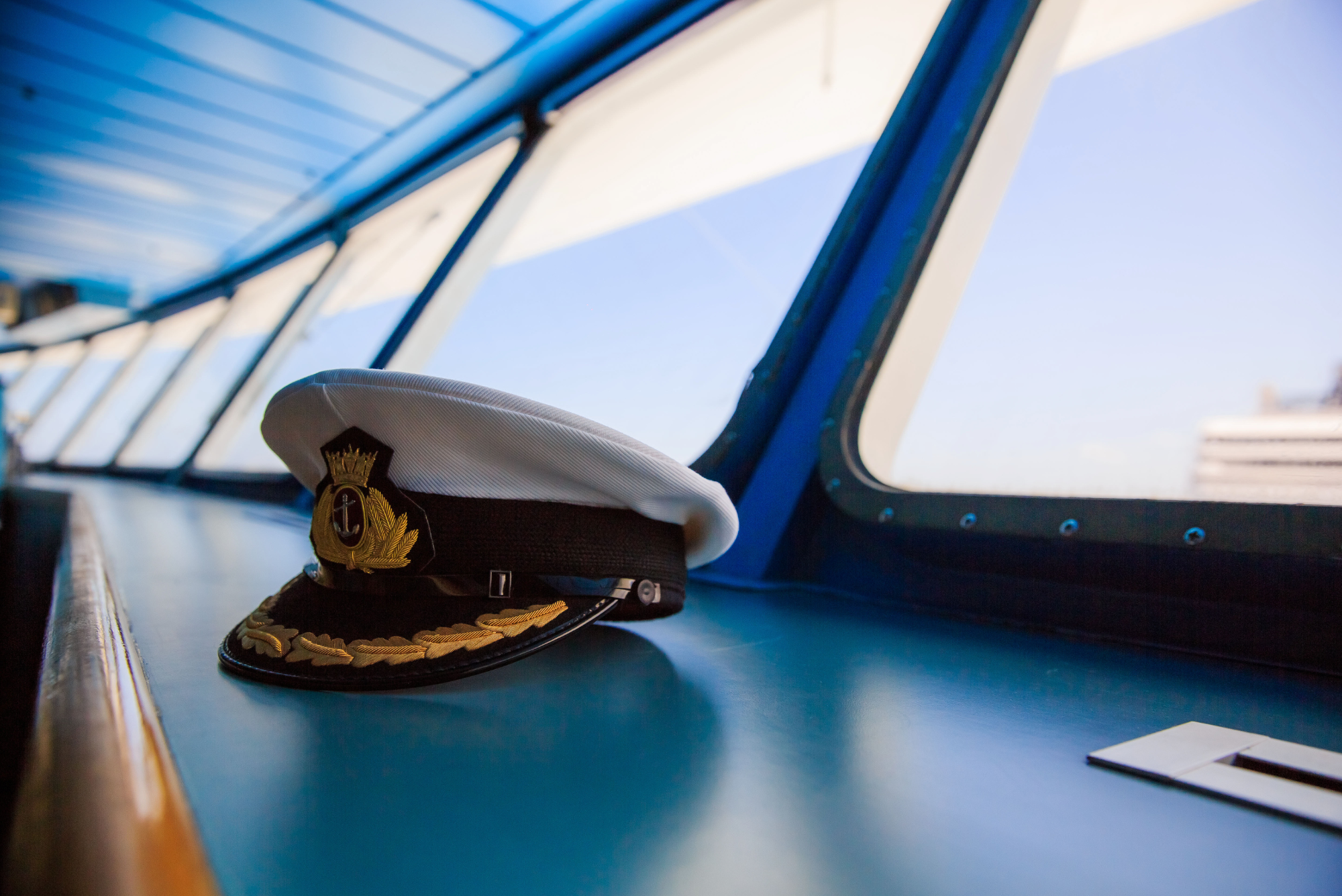 A captain’s hat aboard a boat, after the achievement of completing the captain license requirements.
