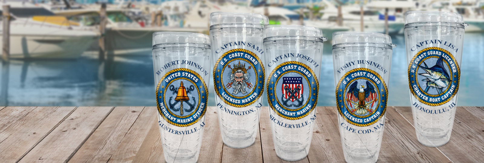 5 personalized tumblers on dock