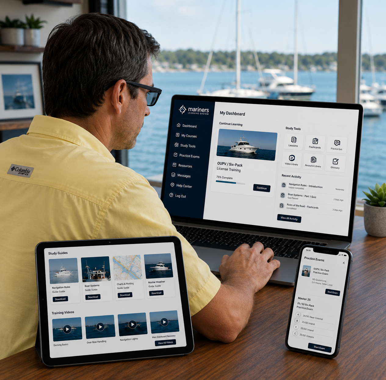 Man with lap top ipad and phone image