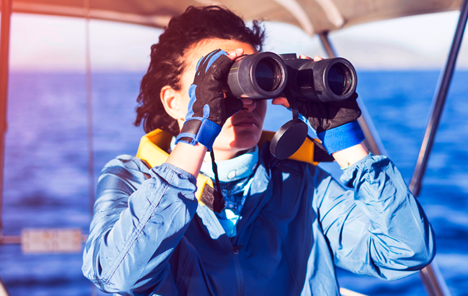 person using binoculars