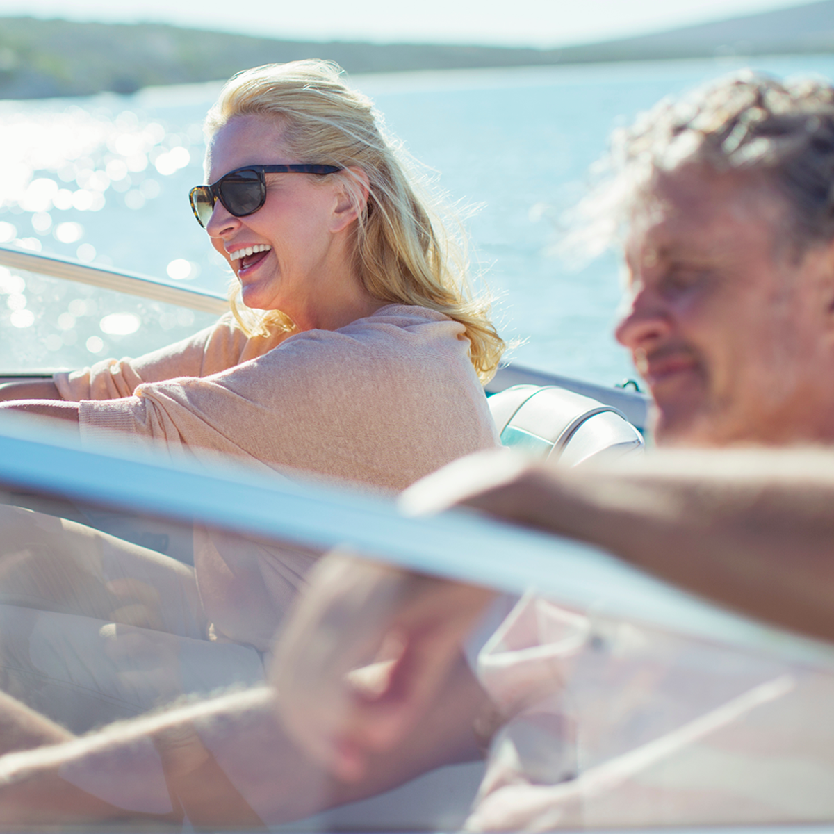 closeup of man and woman on boat