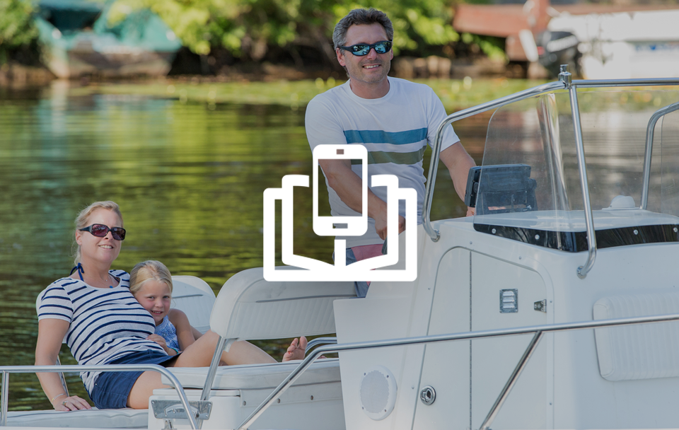 family on boat with book and phone icon in front
