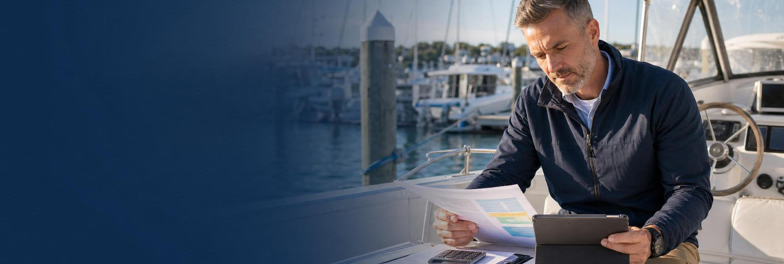 Man on boat with paper work banner image